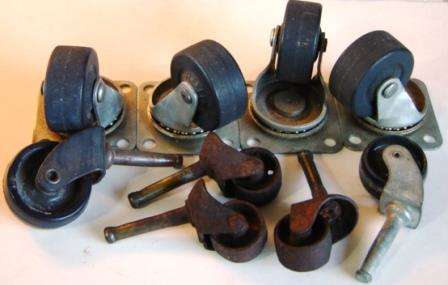 A Lot of 9 Antique Furniture Casters Various types.