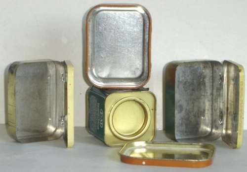 A group of four Vintage Tins.   Three for tablets, one tea tin.