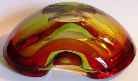A very attractive Red & Green Glass Pansy Bowl. ( I don't want to call it an ashtray. :-)  )
