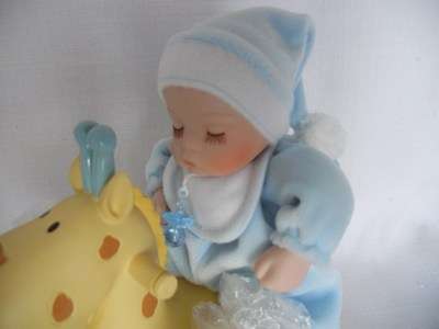 Baby Boy - Musical baby sitting on Giraffe - Blue