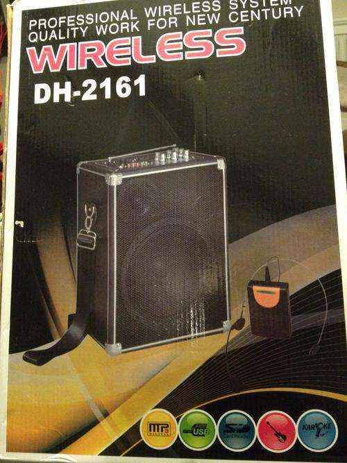 WIRELESS LOUDSPEAKER SYSTEM + WIRELESS MICROPHONE - USB, SD, FM RADIO, KARAOKE ETC.....