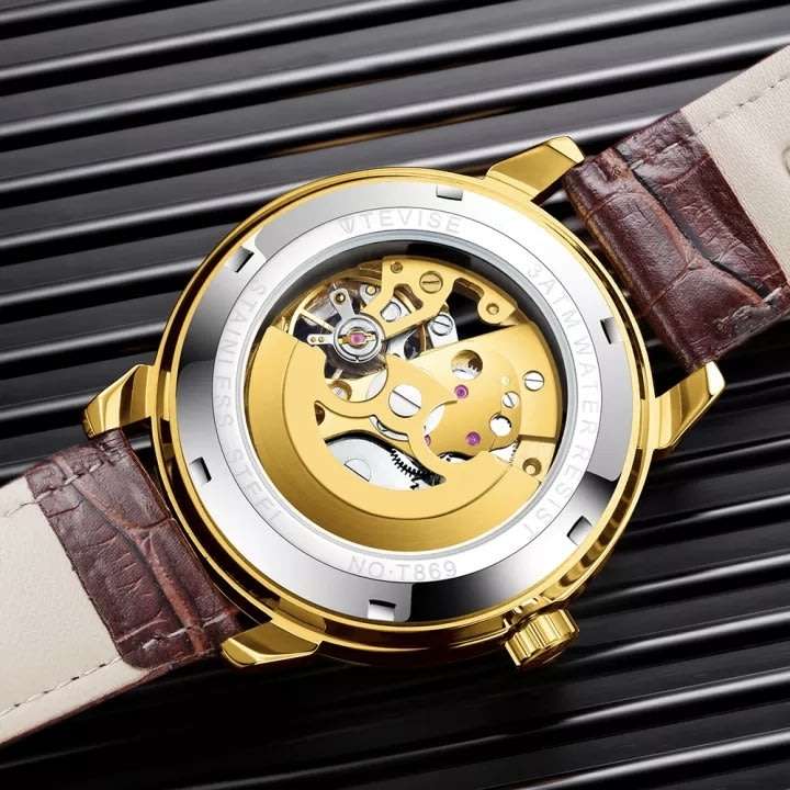 Retail: R2,399.00 TEVISE ® Men`s Metropolis Leather Gold Watch BRAND NEW