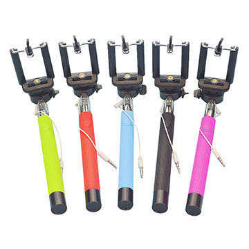 Plug-In Selfie Stick. Extendable Handle With Holder For All Mobile Phones. Assorted colors available