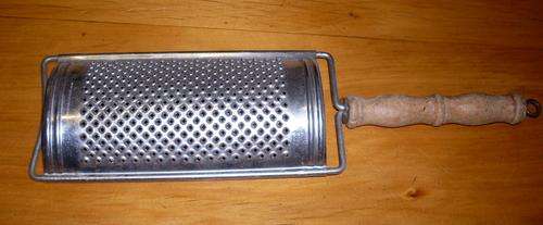 Grater with wooden handle