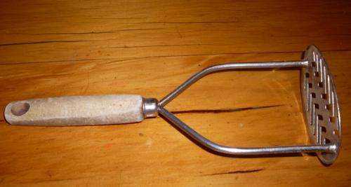 masher with wooden handle