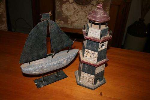 wooden lighthouse and boat