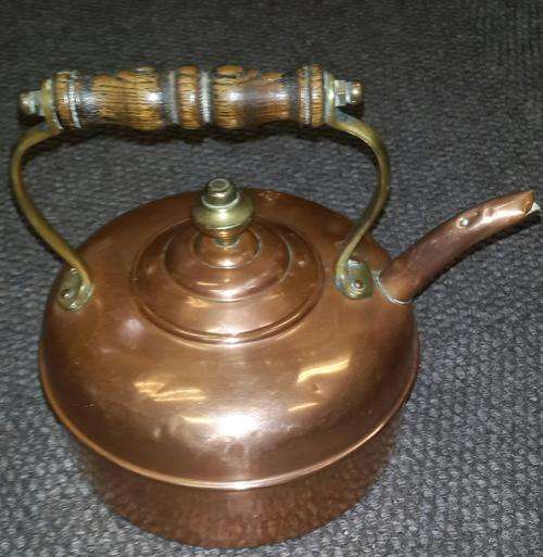 Brass and copper vintage kettle with oak handle circa 1920