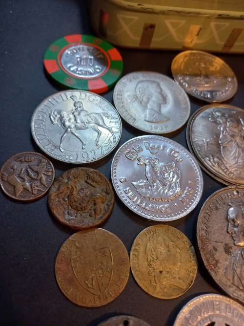 Collection of Medals, tokens,coins and more in Vintage tin