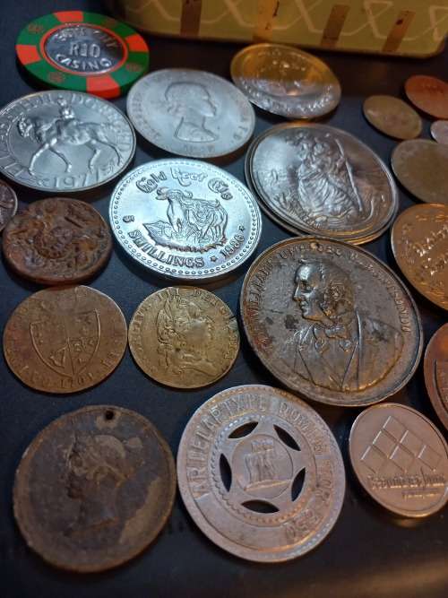 Collection of Medals, tokens,coins and more in Vintage tin