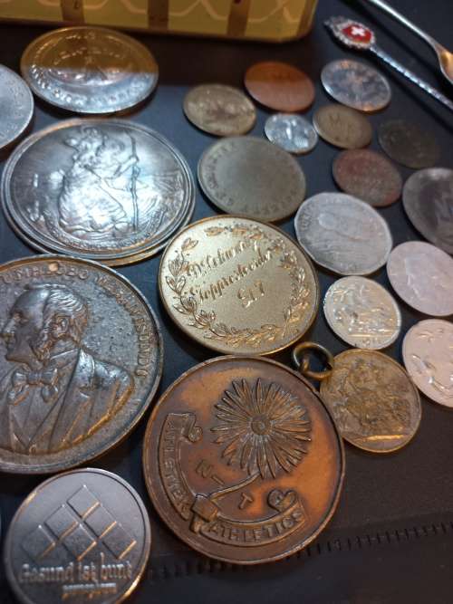Collection of Medals, tokens,coins and more in Vintage tin