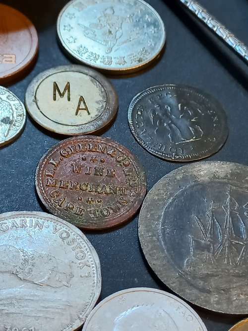 Collection of Medals, tokens,coins and more in Vintage tin