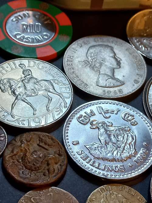 Collection of Medals, tokens,coins and more in Vintage tin