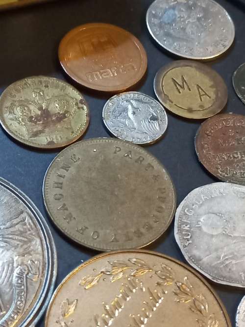 Collection of Medals, tokens,coins and more in Vintage tin