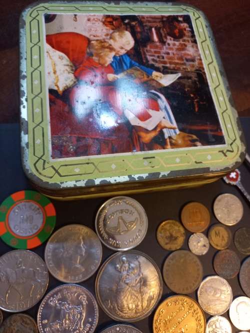 Collection of Medals, tokens,coins and more in Vintage tin
