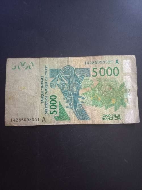 Central Africa 5000 Francs. Scarcer, but condition is in well curculated and used condition.