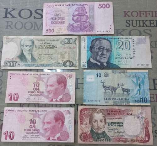 7 Mixed International notes. Bid per note to take all 7
