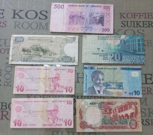 7 Mixed International notes. Bid per note to take all 7