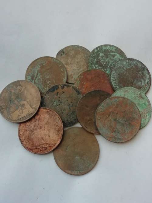 12 Great Britain Pennies(Well circulated) One bid