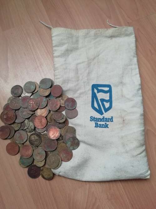 Standard bank coin bag (including 119 old SA coins)
