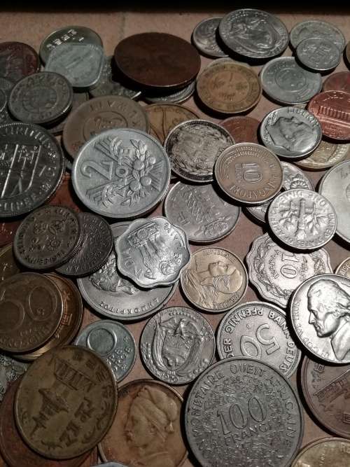 Vintage tin including 130 mixed coins - one bid