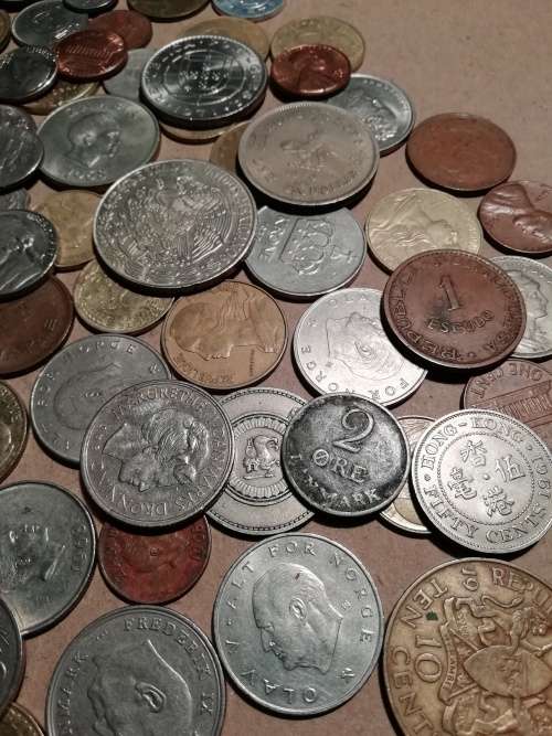 Vintage tin including 130 mixed coins - one bid