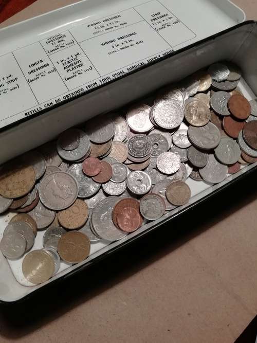 Vintage tin including 130 mixed coins - one bid
