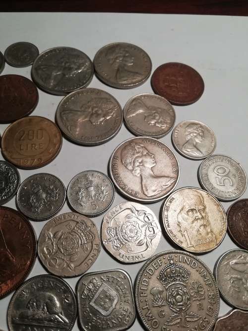 55 Mixed International coins. One bid for the lot
