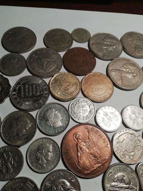 55 Mixed International coins. One bid for the lot