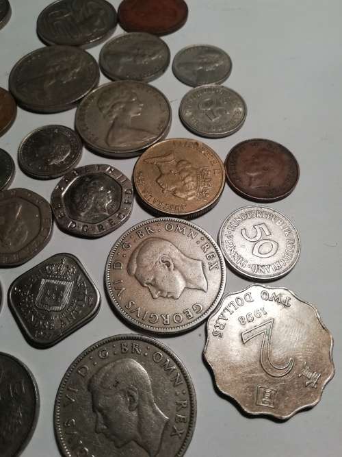 55 Mixed International coins. One bid for the lot