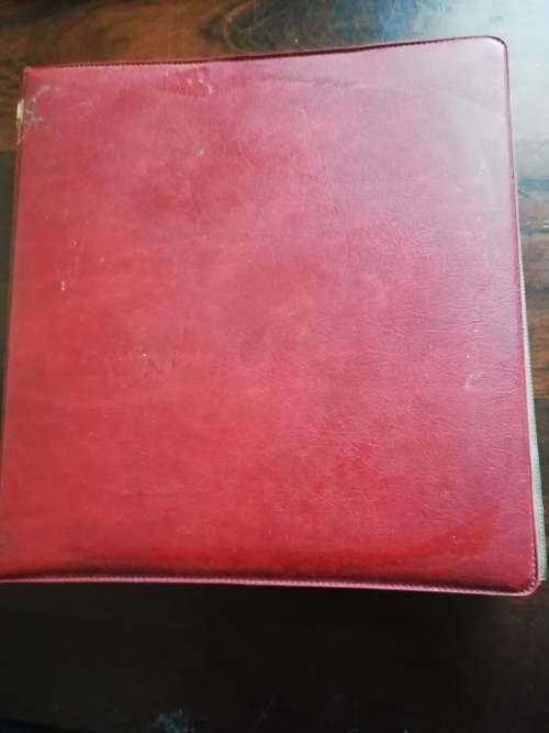 Bickels Coin Album with sleeves and 58 mixed coins.