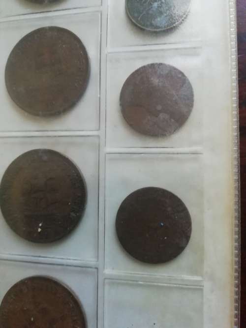Bickels Coin Album with sleeves and 58 mixed coins.