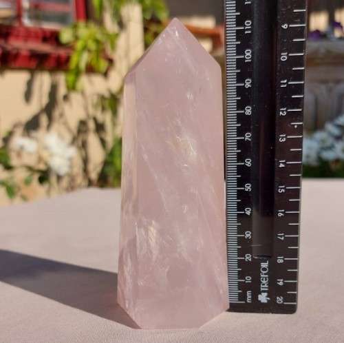 A 400G ROSE QUARTZ OBELISK WITH A 6 FACETTED POINT  CUT AND POLISHED IN ZAMBIA