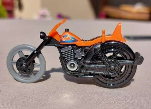 A POP CYCLE TYPE RIP CORD MOTORCYCLE  NO RIDER OR ZIP CORD