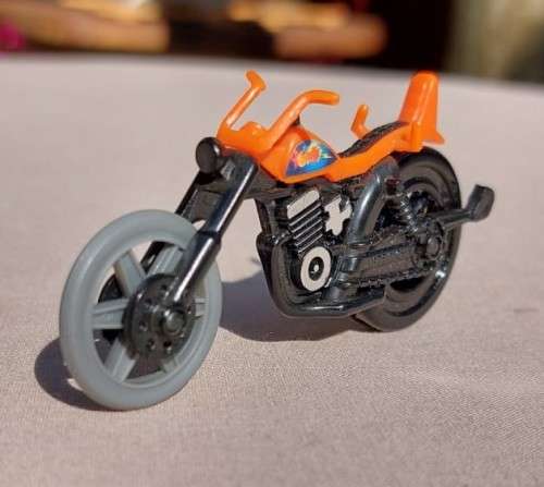 A POP CYCLE TYPE RIP CORD MOTORCYCLE  NO RIDER OR ZIP CORD