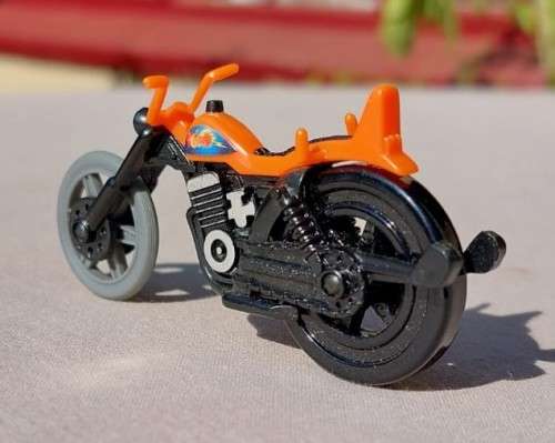 A POP CYCLE TYPE RIP CORD MOTORCYCLE  NO RIDER OR ZIP CORD