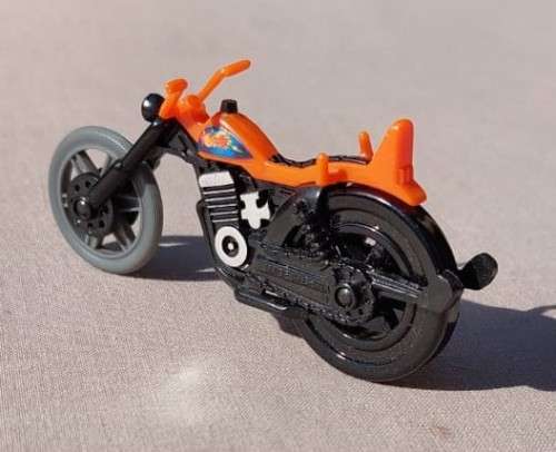 A POP CYCLE TYPE RIP CORD MOTORCYCLE  NO RIDER OR ZIP CORD
