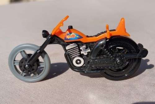 A POP CYCLE TYPE RIP CORD MOTORCYCLE  NO RIDER OR ZIP CORD