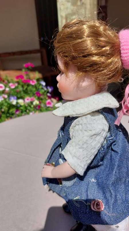 CUTE HIGH QUALITY PORCELAIN DOLL WITH BLUE EYES AND BIG EYELASHES ON STAND