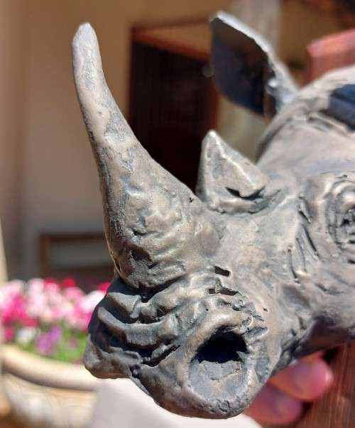 WHITE RHINO HENKMAM CLAY SCULPTURE WITH BRONZE COATING ON WOODEN WALL MOUNT