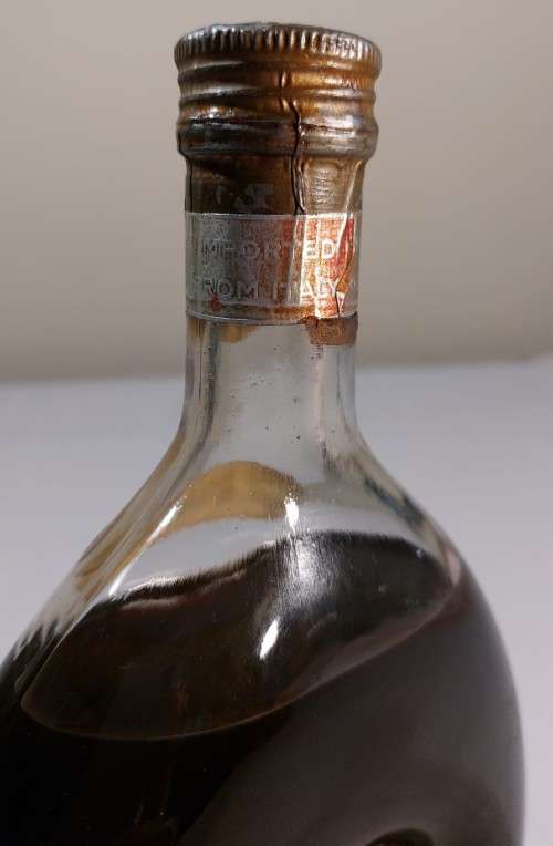 KAISER W GERMAN CLOCK (WORKING) IN AN 60 YEAR OLD! ITALIAN CHERRY WINE BOTTLE (FULL) ULTRA RARE
