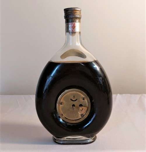 KAISER W GERMAN CLOCK (WORKING) IN AN 60 YEAR OLD! ITALIAN CHERRY WINE BOTTLE (FULL) ULTRA RARE