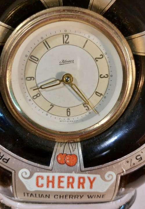 KAISER W GERMAN CLOCK (WORKING) IN AN 60 YEAR OLD! ITALIAN CHERRY WINE BOTTLE (FULL) ULTRA RARE