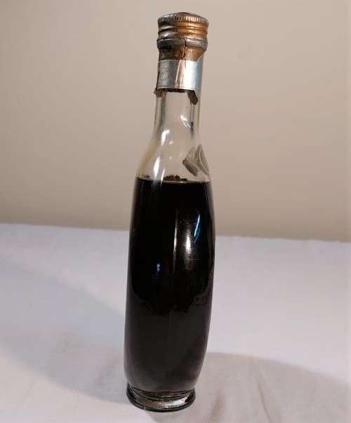 KAISER W GERMAN CLOCK (WORKING) IN AN 60 YEAR OLD! ITALIAN CHERRY WINE BOTTLE (FULL) ULTRA RARE