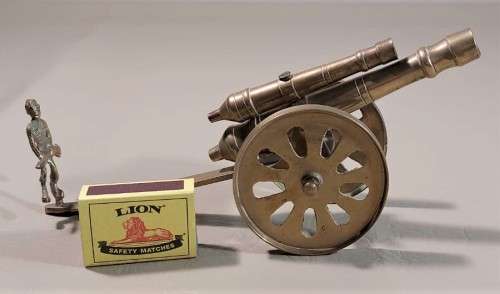 RARELY SEEN BRASS DOUBLE BARREL CANNON WITH SOLDIER ON BACK  ARTILLERY MILITARY TOY