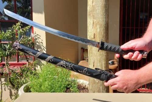 SAMURAI WAKIZASHI SWORD WITH DRAGON MOTIF DECORATED GUARD AND SCABBARD - 80CM LONG