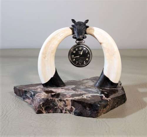 STRIKING WARTHOG TUSKS MOUNTED POCKET WATCH STAND WITH POSSIBLE SILVER MASQUE (WATCH NOT INCLUDED)