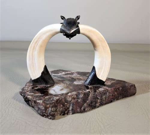 STRIKING WARTHOG TUSKS MOUNTED POCKET WATCH STAND WITH POSSIBLE SILVER MASQUE (WATCH NOT INCLUDED)