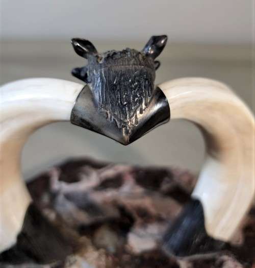 STRIKING WARTHOG TUSKS MOUNTED POCKET WATCH STAND WITH POSSIBLE SILVER MASQUE (WATCH NOT INCLUDED)
