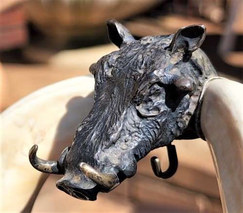 STRIKING WARTHOG TUSKS MOUNTED POCKET WATCH STAND WITH POSSIBLE SILVER MASQUE (WATCH NOT INCLUDED)