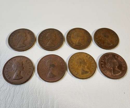 A 1953-1960 CRONOLOGICAL SET OF 8 SOUTH AFRICAN ONE PENNY COINS FIRST PORTRAIT OF QUEEN ELIZABETH II
